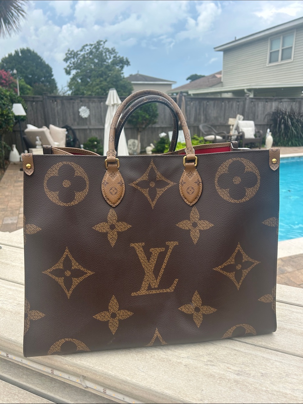 Louis Vuitton OnTheGo GM in Monogram/ Monogram Reverse Giant canvas.